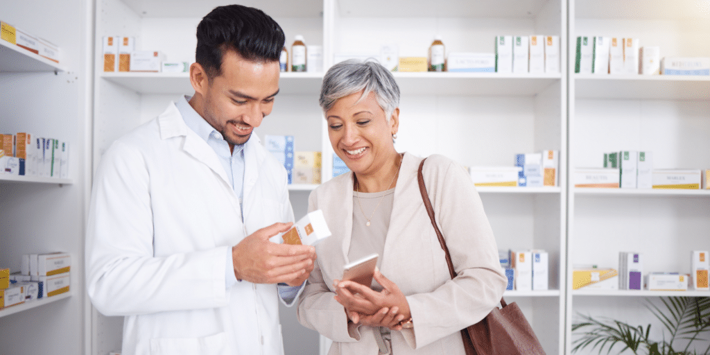 Patient looking at medicine with Pharmacy assistant - Understanding the Role of Pharmacy Assistants in Alberta: Your Questions Answered