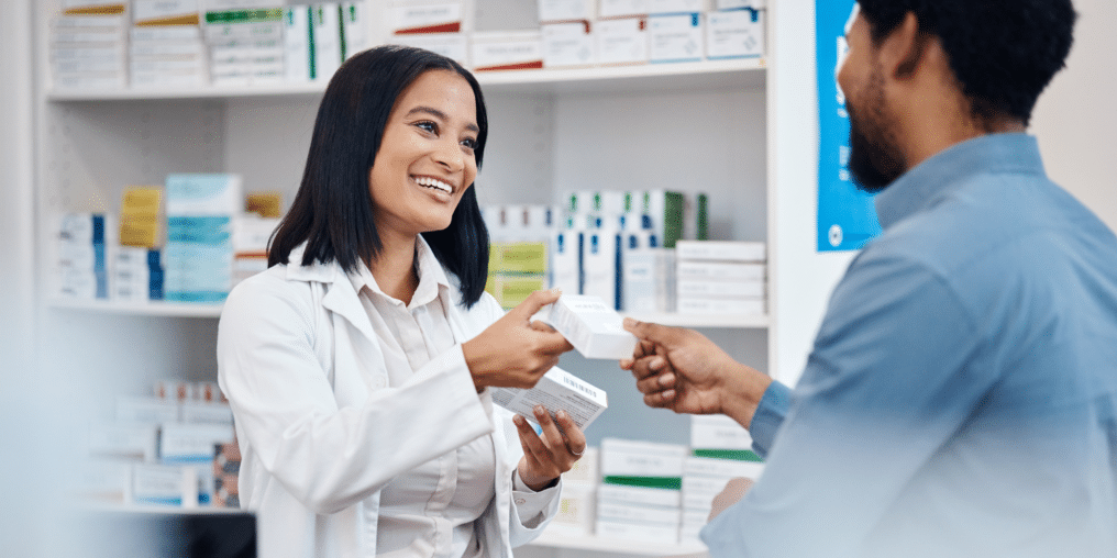 Pharmacy Assistant Helping a Customer - How in Demand are Pharmacy Assistants in Alberta? We Have the Stats